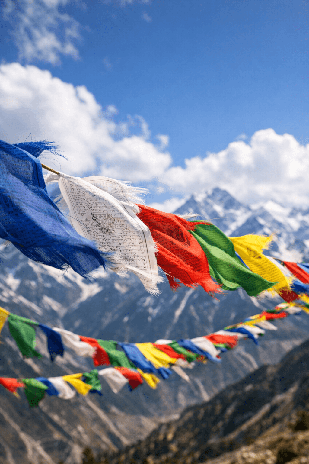 Prayer flags against mountain backdrop